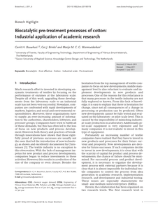 Biocatalytic pre-treatment processes of cotton